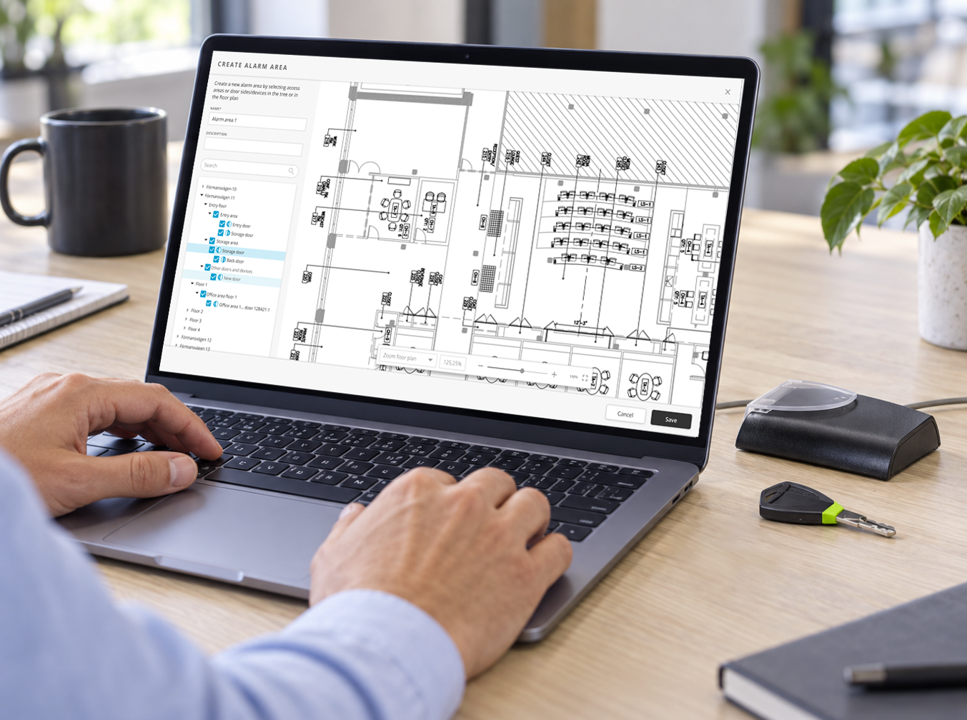 Access-control floor plan displayed on a laptop